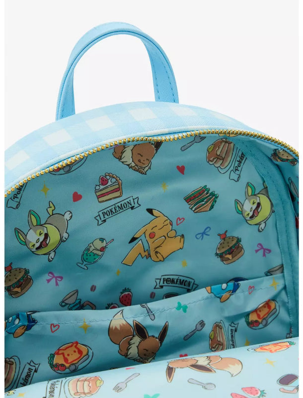 Light blue backpack with cartoon character pattern on a white background