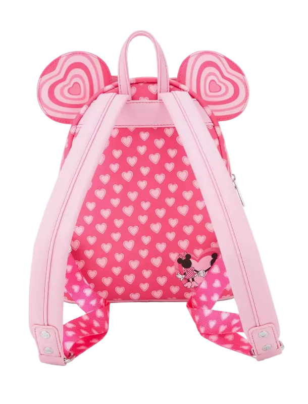 Pink backpack with heart pattern and ears on a white background