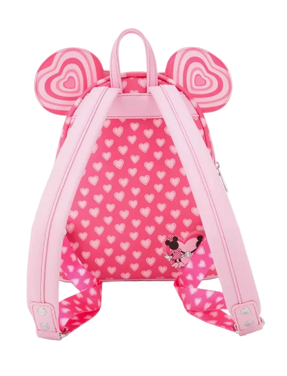 Pink backpack with heart pattern and ears on a white background