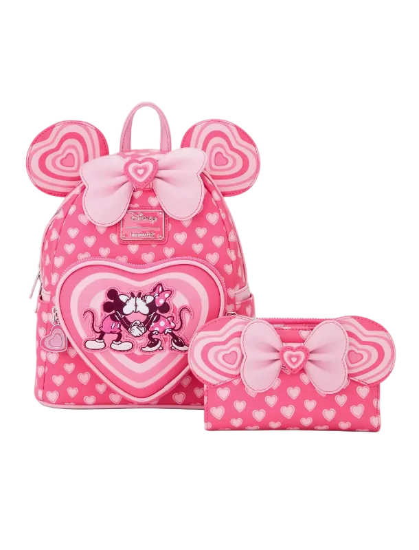 Pink backpack with heart design and Minnie Mouse illustration, accompanied by a matching pencil case on a white background.