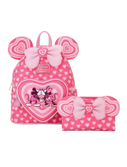 Pink backpack with heart design and Minnie Mouse illustration, accompanied by a matching pencil case on a white background.