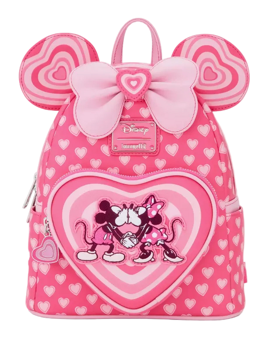 Pink backpack with heart design and Minnie Mouse illustration on a white background