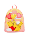 A pastel pink and yellow Disney Winnie the Pooh backpack featuring a large applique of Winnie the Pooh holding red and yellow heart-shaped balloons, with a pink Disney Memory Lane patch on the front.