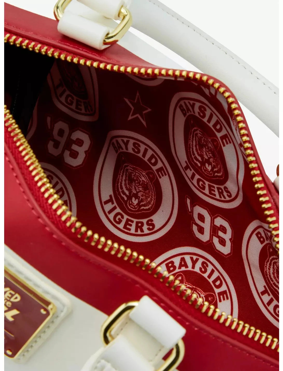 Close-up of interior lining in Bayside High Megaphone Crossbody Bag with red and white Bayside Tigers and '93' graphics for added fan detail.
