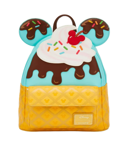 Backpack designed like a ice cream cone with cherry on top, chocolate syrup, and sprinkles.