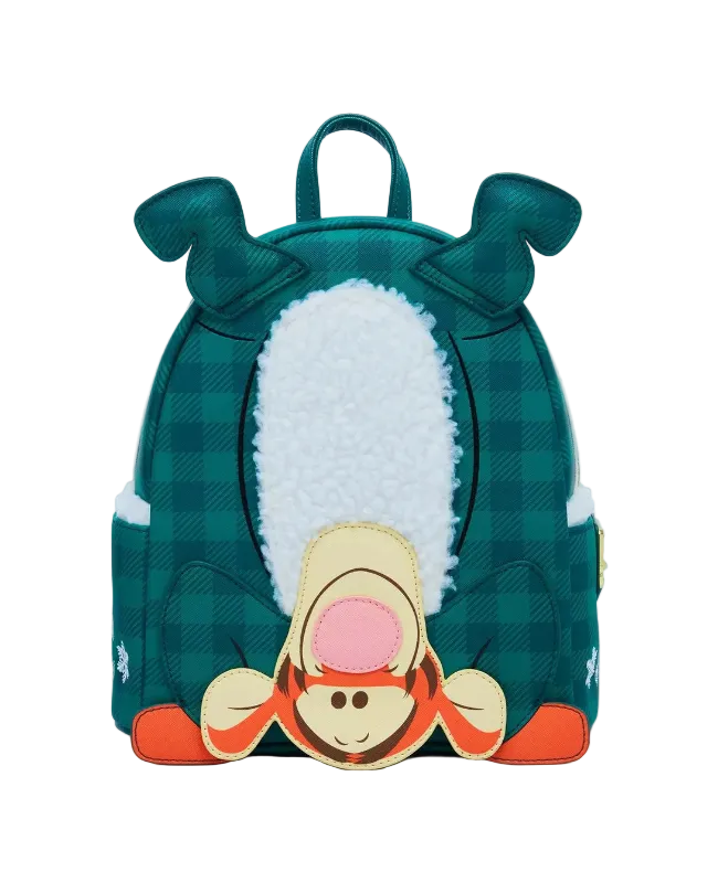 Green backpack with cartoon character face on a white background
