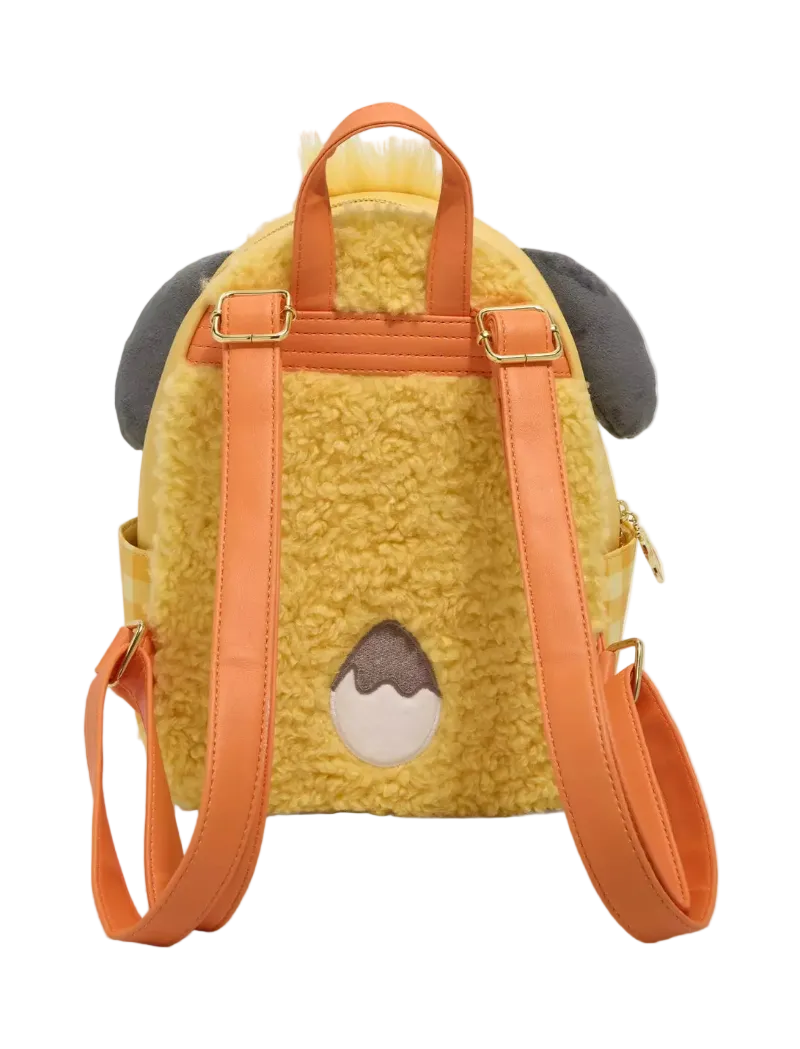 A yellow sherpa dog backpack with orange straps, gray ears, and a brown and cream patch on the back, shown against a light gray background.