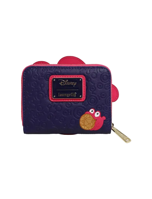 A Disney Loungefly zip-around wallet in dark purple with pink accents, featuring a textured embossed pattern, a pink Disney logo plaque, and a pink character applique on the front.