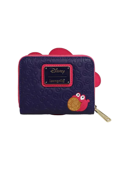 A Disney Loungefly zip-around wallet in dark purple with pink accents, featuring a textured embossed pattern, a pink Disney logo plaque, and a pink character applique on the front.