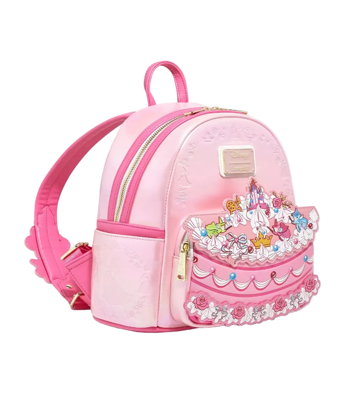 Pink backpack with a decorative cake design on a white background