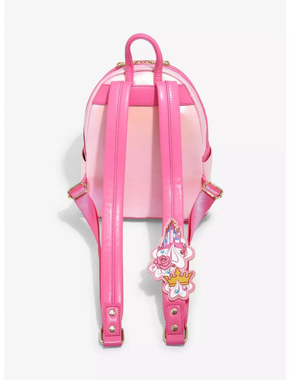 Pink backpack with a decorative strap on a white background