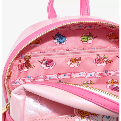 Pink backpack with decorative patterns on a white background