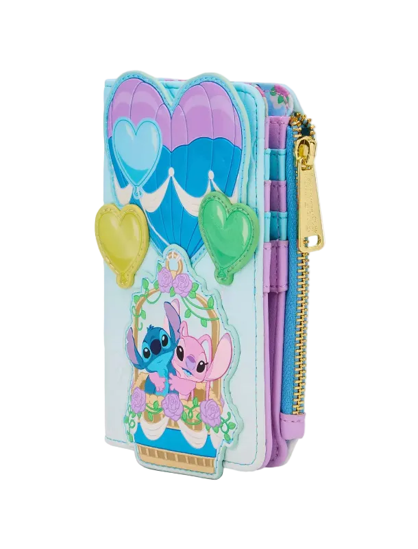 A light blue zip-around wallet featuring Stitch and Angel from Lilo & Stitch, decorated with purple and blue hot air balloons, heart-shaped charms, and a gold zipper.