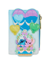 A light blue faux-leather wallet featuring a hot air balloon and heart design, with a front patch depicting Stitch and Angel in a basket, and a gold zipper pull.