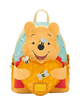 Backpack designed like a bear character with honeycomb and bee details on a white background