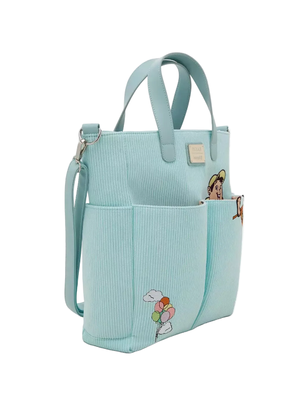 Light blue tote bag with cartoon character on a white background