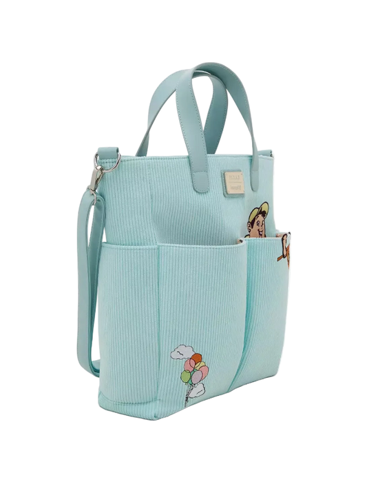 Light blue tote bag with cartoon character on a white background