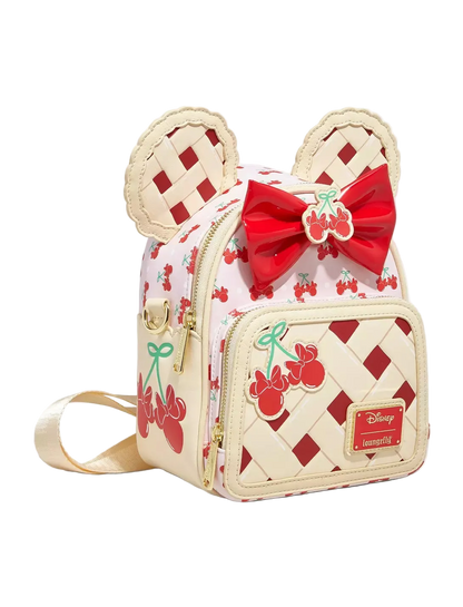 Backpack with cherry pie design and bow detail on a white background