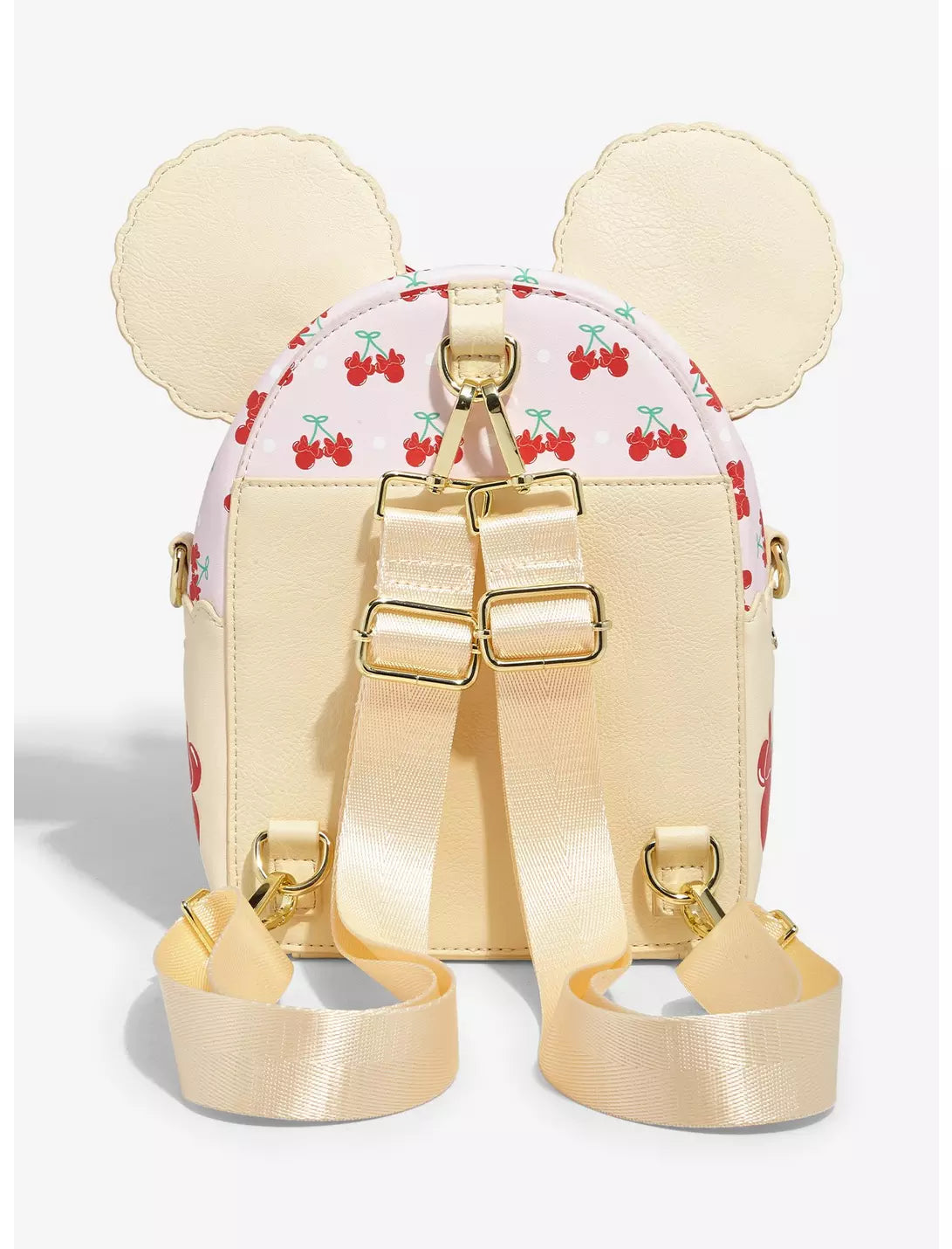 Backpack with cherry pattern and gold accents on a white background