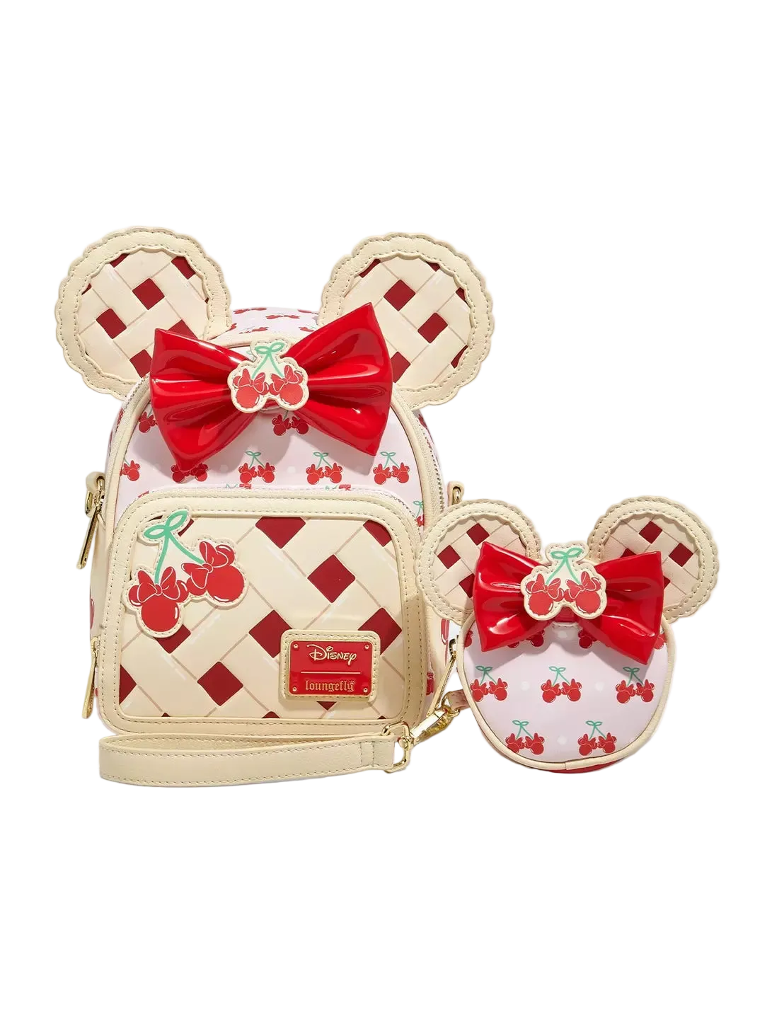 Disney-themed bag and coin purse with red bows and cherry designs on a white background