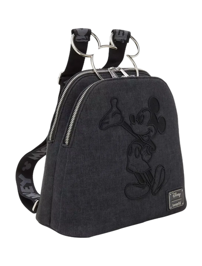 Black backpack with Mickey Mouse design on a white background