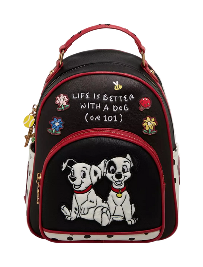 Black backpack with cartoon dogs and text 'Life is better with a dog (or 101)' on a white background