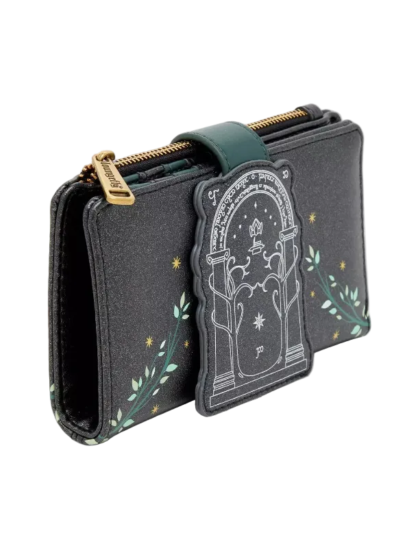 A black faux-leather zip-around wallet featuring a green leather strap, gold zipper pulls, and a decorative front patch depicting a tombstone with stars and green leafy vines.