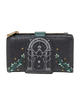 A black glittery zip-around wallet featuring a central tombstone graphic with a star and moon design, flanked by green leafy vines and small gold stars, with a gold zipper pull.