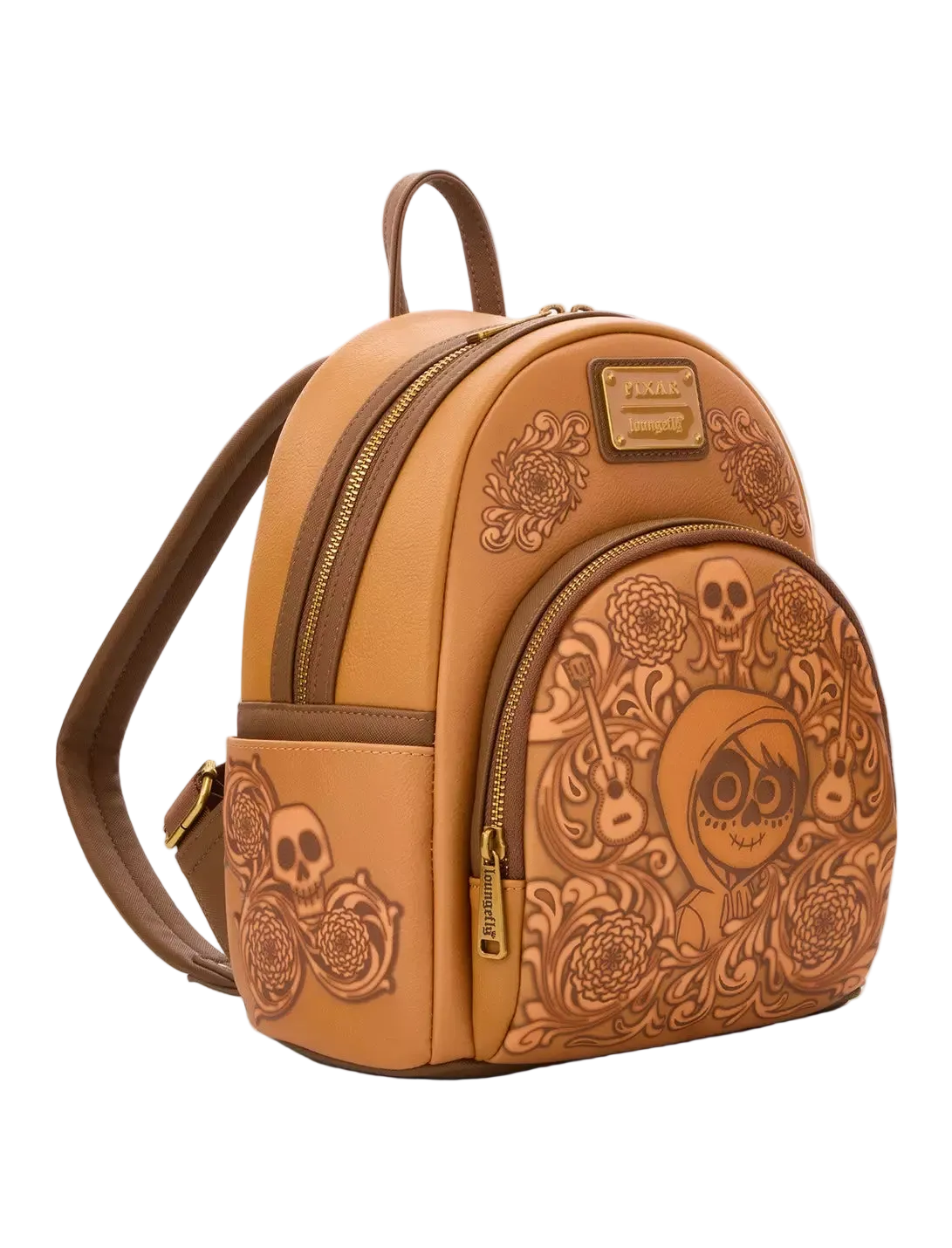 A tan faux-leather mini backpack with skull and floral tole-style embossing, featuring a top handle, adjustable shoulder strap, and gold-tone zipper pulls, shown on a light gray background.