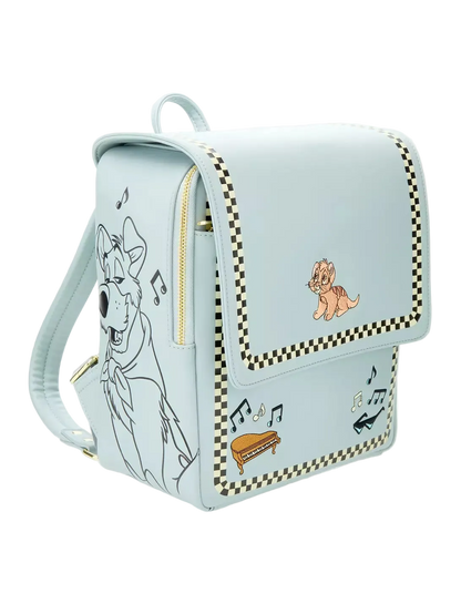 A light blue faux-leather backpack featuring cartoon dog illustrations, musical notes, and checkered trim, shown on a clean white background.