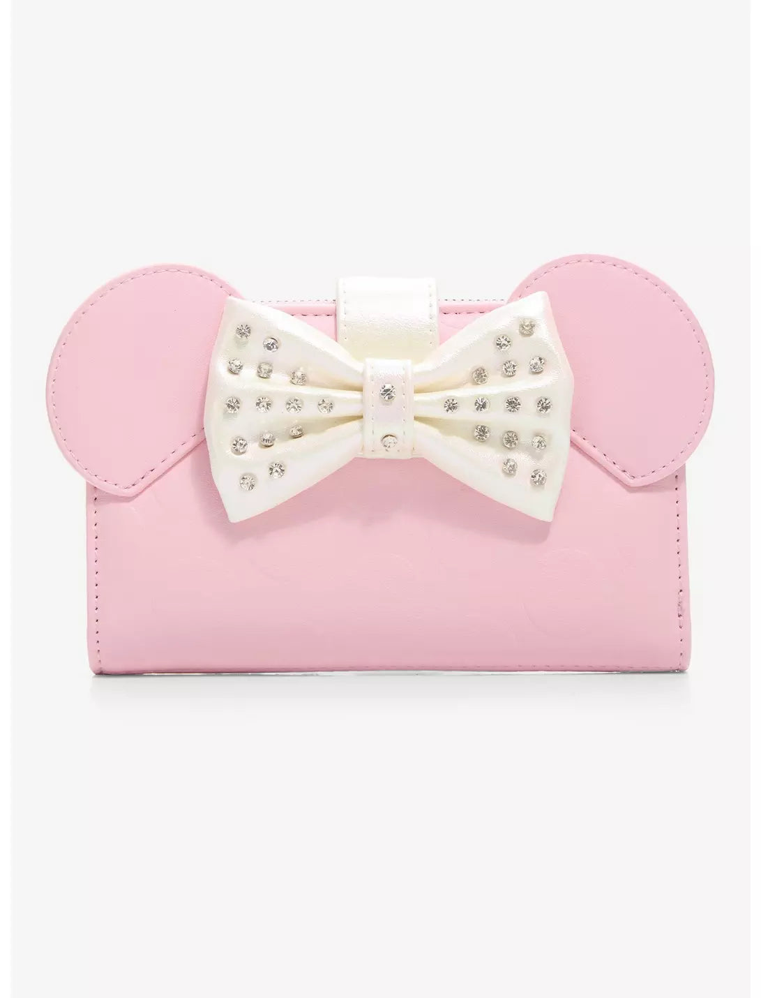 A pink faux-leather clutch bag featuring Minnie Mouse-inspired round ears and a large white bow embellished with rhinestones, shown against a plain white background.