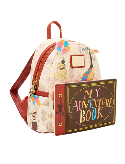 A Disney Up in the Air themed mini backpack with a matching 'My Adventure Book' wallet, featuring characters from the film on a light beige patterned background with red leather accents.