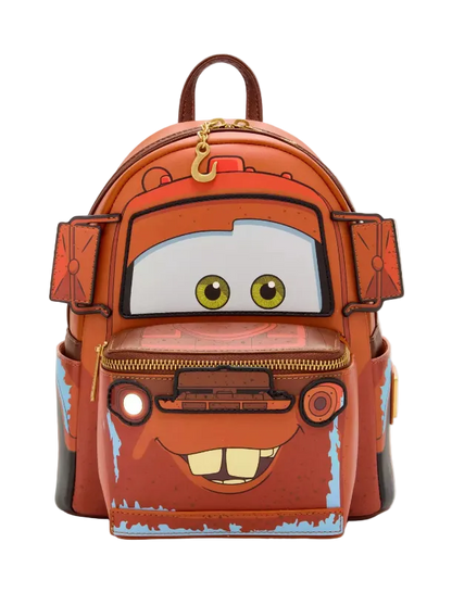 Backpack designed like a character with a face, featuring large eyes and a mouth on a white background.