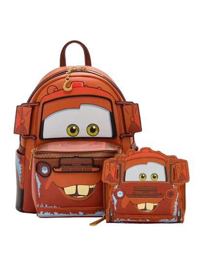 A Disney Cars backpack and matching zip pouch set featuring Mater the rusty red car character, shown on a clean light gray background.