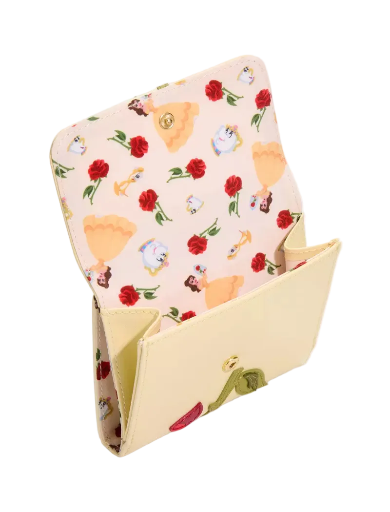 A cream-colored leather wallet shown open, featuring a light pink patterned interior printed with red roses and Disney's Beauty of the Beast characters, with a small gold clasp on the front flap.