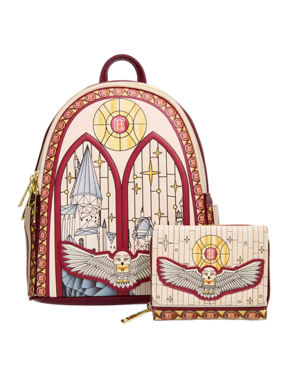 A matching backpack and zip wallet set featuring an ornate stained-glass-style design with a red owl motif, gold sun emblem, and cream background, shown on a light gray studio background.