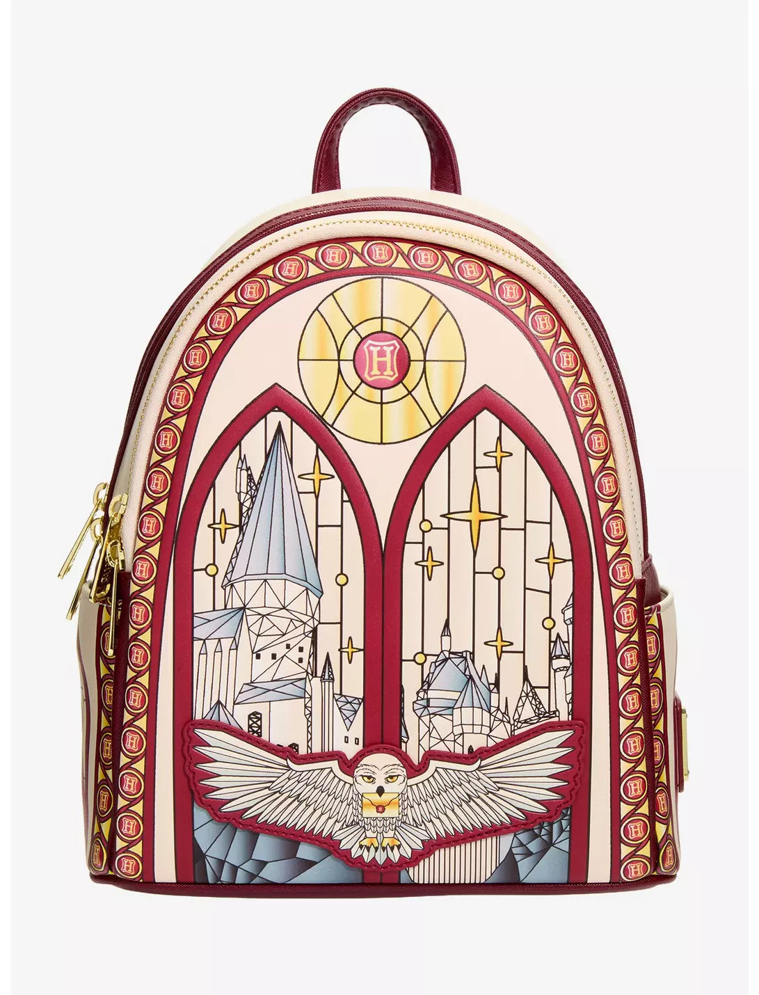 A small backpack styled like a stained-glass window, featuring a cream background with red borders, gold star details, and an illustration of Hogwarts and an owl at the bottom.