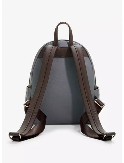 A gray and dark brown backpack shown from the back, featuring a textured gray body, dark brown straps, and silver metal buckles, set against a plain white background.