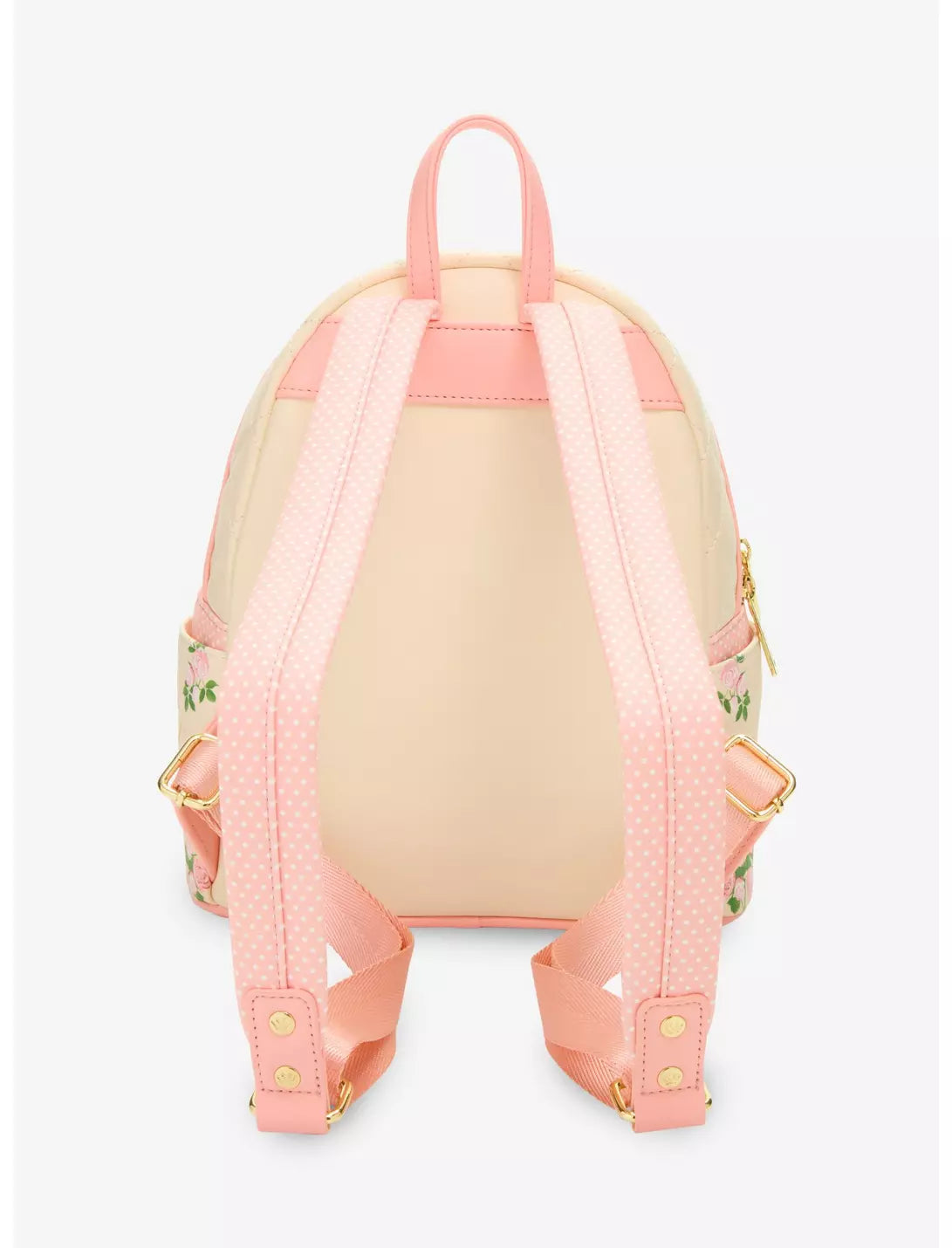 A small backpack shown from the back, featuring a light peach-pink body with wide matching shoulder straps, gold-tone hardware, and floral embroidery on the side panels.
