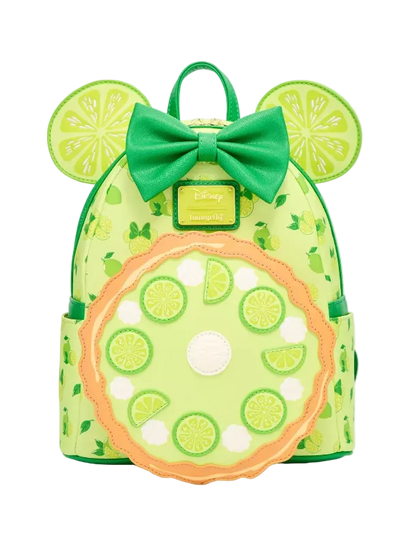 A lime green backpack styled like a Minnie Mouse head, featuring a green bow, round mouse ears with lime slice patterns, and a large circular lime wheel applique on the front pocket.