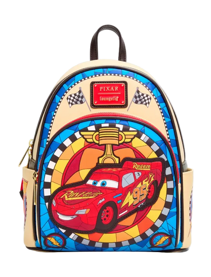A Disney Pixar Lightning McQueen themed backpack featuring a colorful stained-glass style design with a red race car, trophy, and checkered flags on a light beige background.