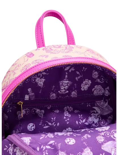A close-up of a small backpack with a pink and purple floral print, featuring a bright pink handle and a purple interior with a floral pattern.