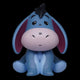 Blue donkey figurine with a bow on a white background