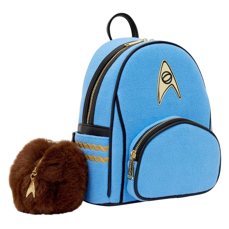 Blue backpack with gold accents and a brown furry item on a white background