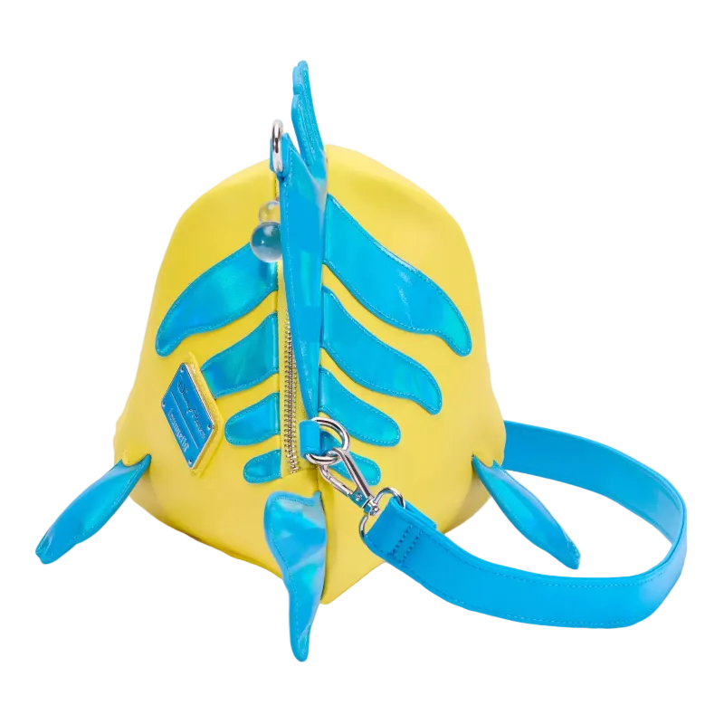 A yellow and blue fish-shaped shoulder bag with a glossy finish, featuring a bright blue spine, pectoral fins, and a matching blue strap, shown on a white background.