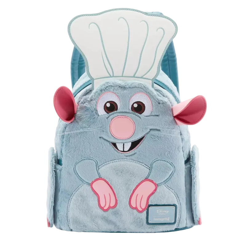 A plush character backpack shaped like a blue mouse wearing a white chef's hat, with pink ears, nose, and paws, shown on a plain white background.