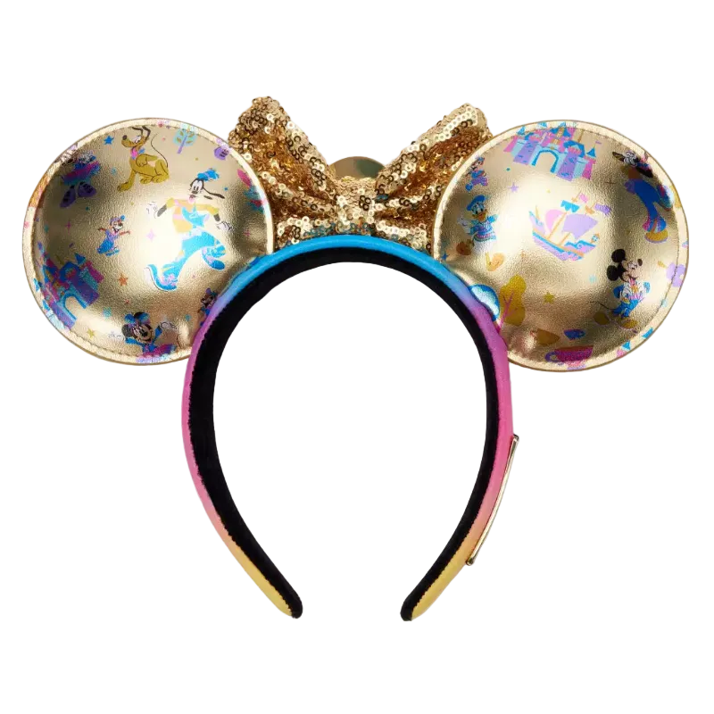 A gold Mickey Mouse ears headband with a glittery gold bow, featuring colorful Disney-themed illustrations on the ears and a pink-to-blue gradient headband.