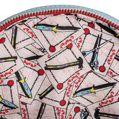 Close-up of a patterned fabric with scissors and text on a white background