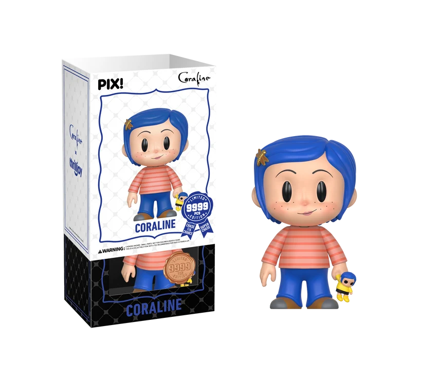 Pix! Coraline collectible figure shown next to its retail box on a plain white background. The figure has bright blue hair, a pink-and-white striped shirt, blue pants, and holds a small yellow-and-blue character.