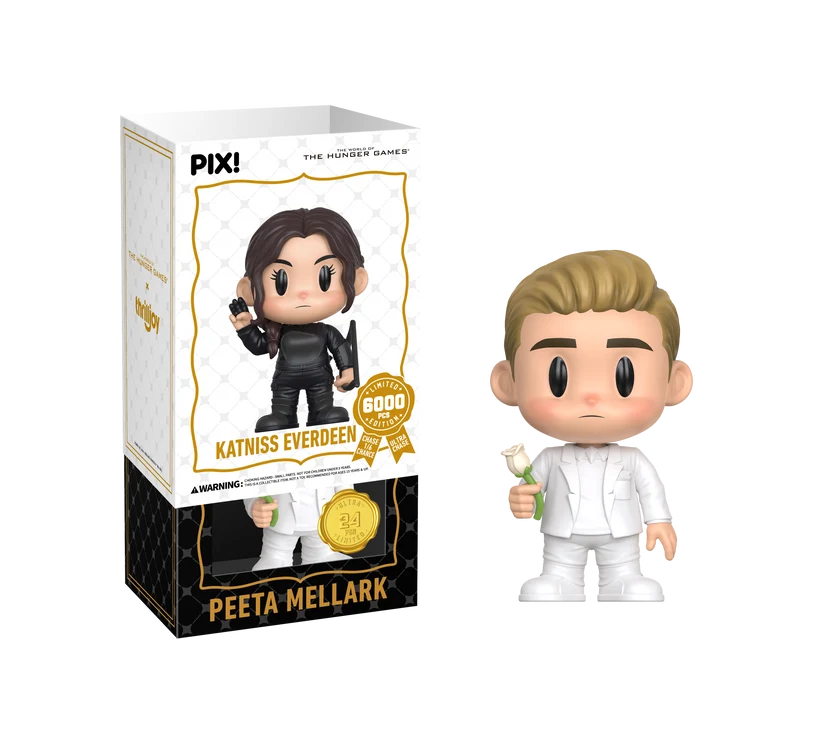 PIX! Peeta Mellark ultra chase figure in a white suit holding a white rose, beside his window box inside the Katniss Everdeen outer sleeve.